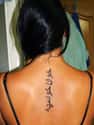 Arabic Script Spine Tattoo on Random Ideas to Get a Tattoo Right Up Your Spine