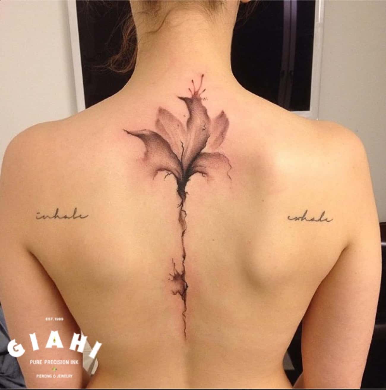 Lily Spine Tattoo