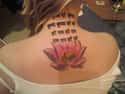 Lotus Spine Tattoo on Random Ideas to Get a Tattoo Right Up Your Spine