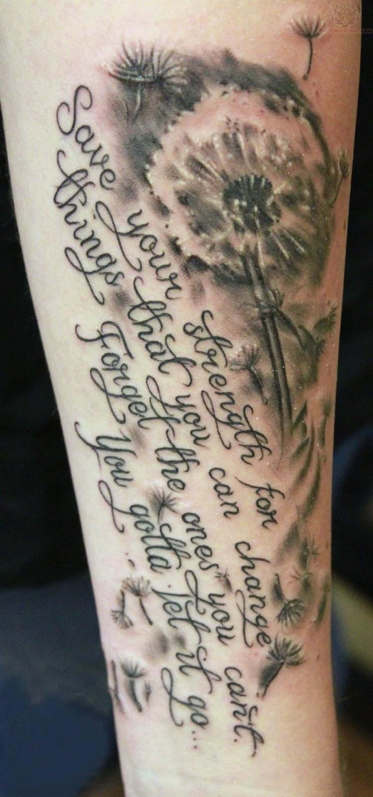 Black Ink Dandelion And Lettering Tattoo