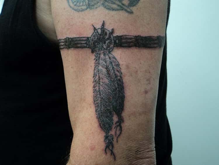 native american feather armband tattoo