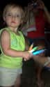 Kid Discovers the Joy of Glow Sticks on Random Adorable Photos of Kid Firsts