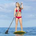 Paddle Surfing on Random Best Solo Sports for Girls