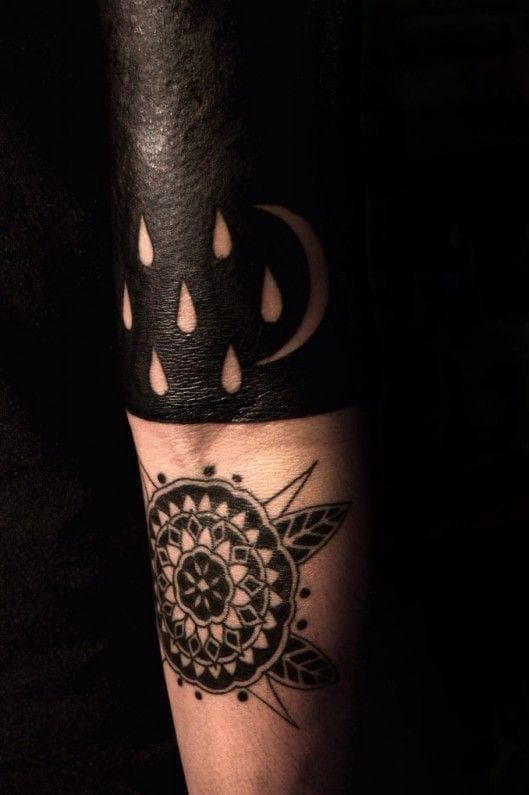 Blackout Tattoos Photos & Solid Black Tattoo Ideas