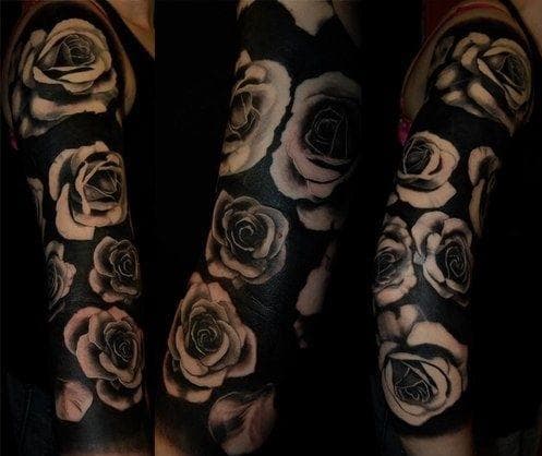 Blackout Tattoos Photos & Solid Black Tattoo Ideas