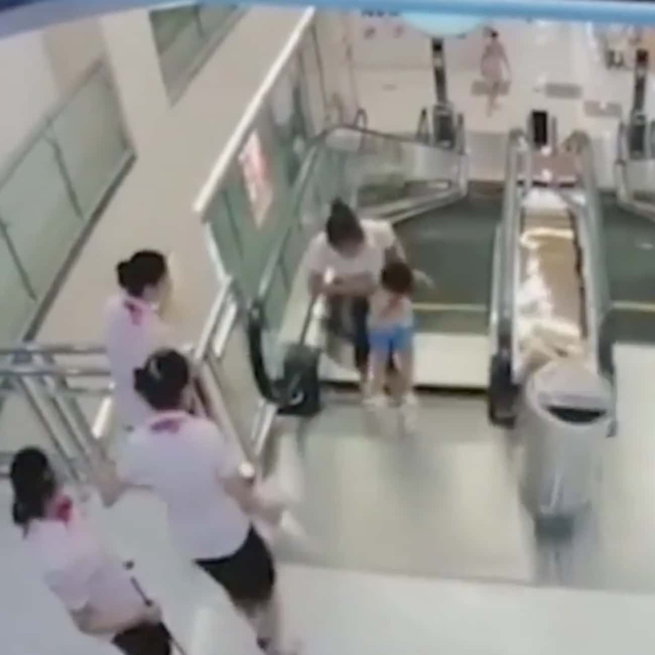 Mother Saves Son but Perishes in Escalator Malfunction