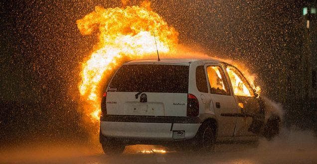 An Empty Stretch of Highway Boasts a Flaming Car
