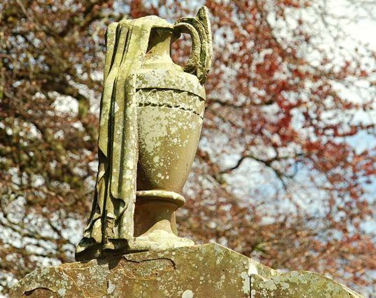 An Urn With Crepe Is A Symbol Of Mourning And The Loss Of An Elder
