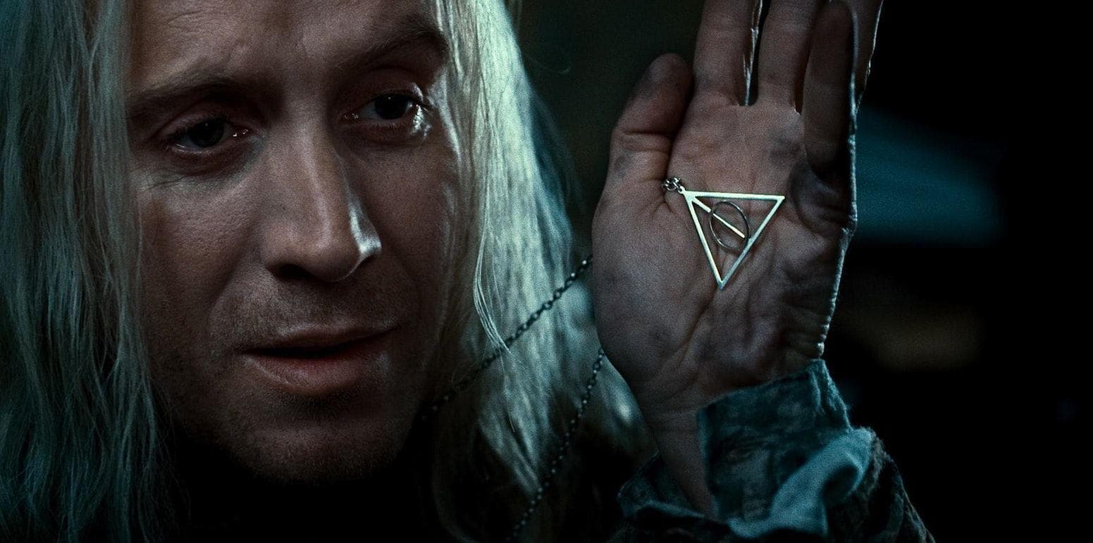The Deathly Hallows Logo - Credence's Necklace
