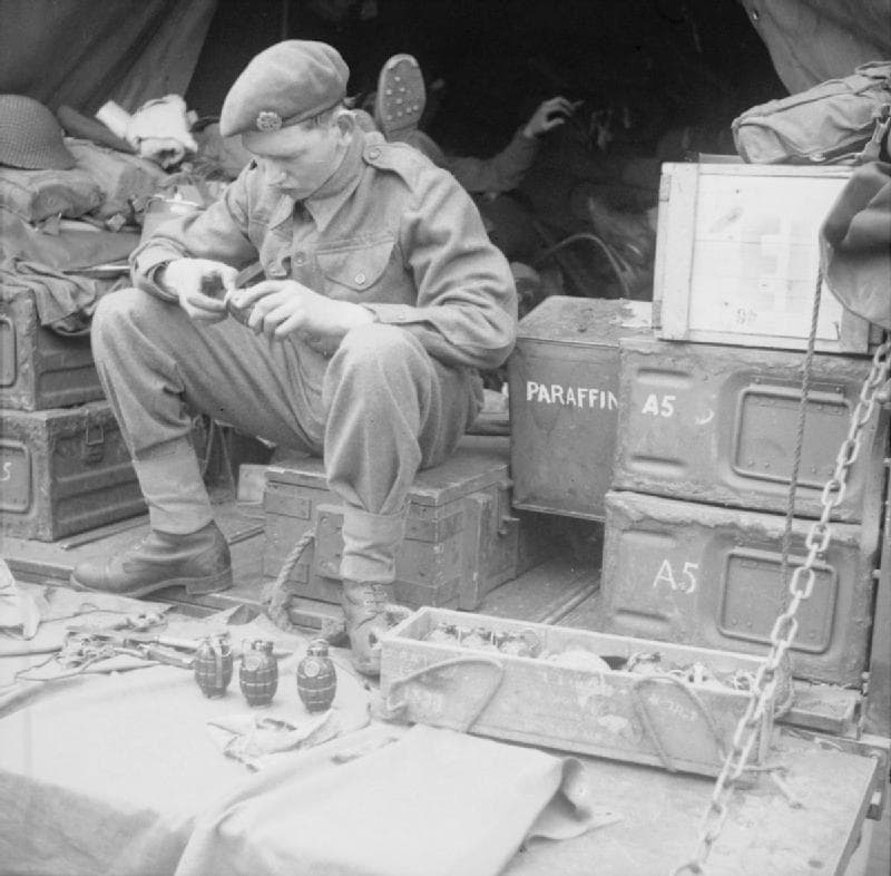A Solider Prepares Hand Grenades Shortly Before D-Day 