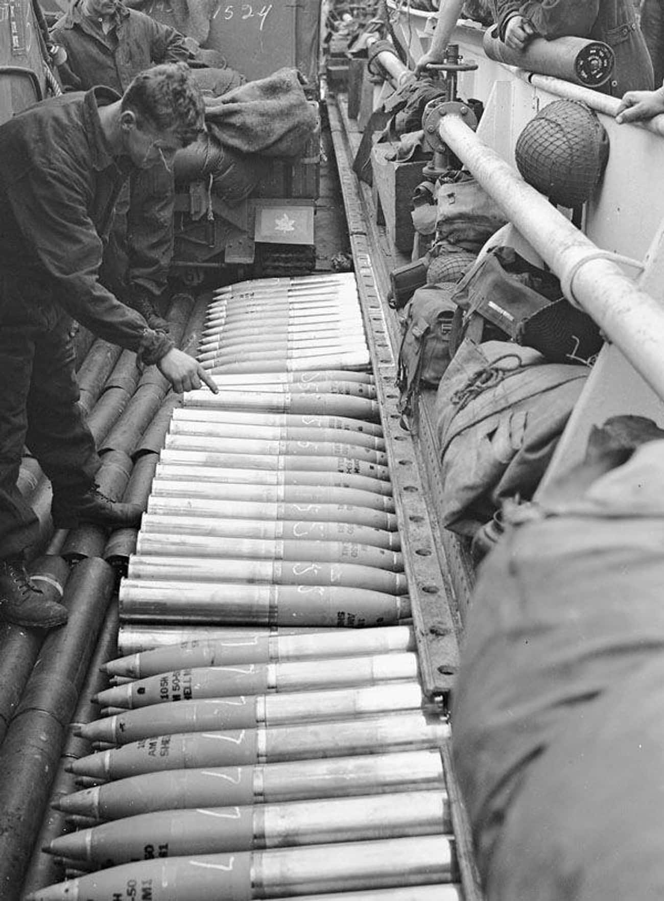 Canadian Artillery Aboard A Ship Tank Counting Out Shells To Use On D-Day