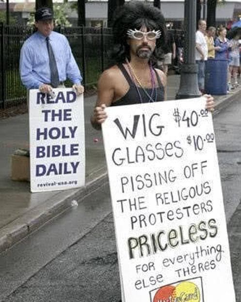 24 People Who Trolled Protesters With Their Own Signs