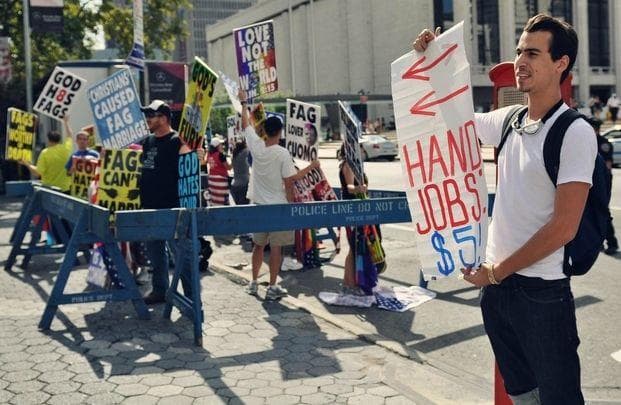 24 People Who Trolled Protesters With Their Own Signs