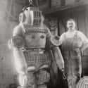 1910 – A Man Stands Next To A Diving Suit on Random Photos That Show You Exactly How Weird History Really Was