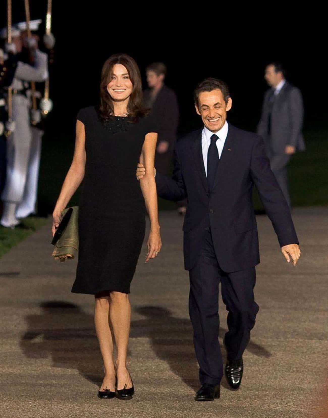Мальчик был невысокий зато очень. Николя Саркози с женой.