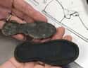 A Child's Shoes on Random Mysterious And Creepy Items Discovered At Jamestown, Virginia