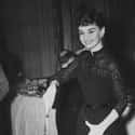 Cutting A Cake At A Reception on Random Rare Audrey Hepburn Photos