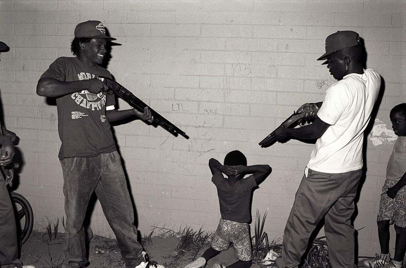 Members Of The Grape Street Crips Stage A Mock Execution With A Pre-Schoole...
