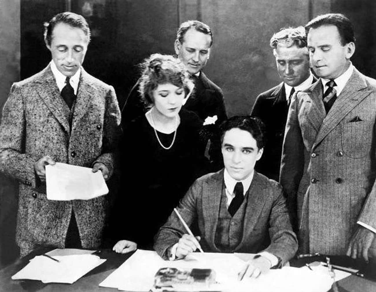 D.W. Griffith, Mary Pickford, Charlie Chaplin, Douglas Fairbanks, And Their Attorneys Sign The Papers Officially Creating The United Artists Corporation, April 17, 1919