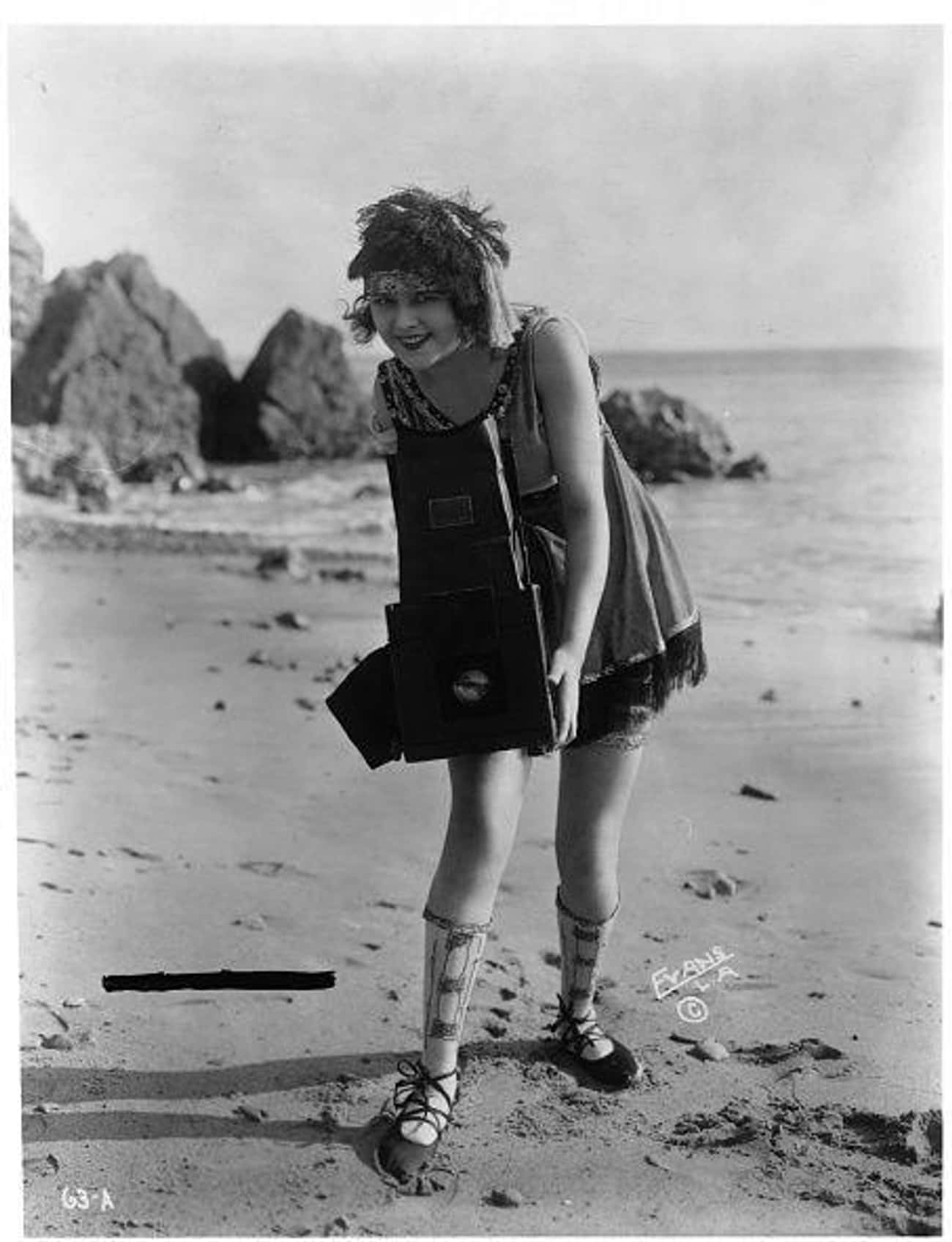Actress Myrtle Linds Holding A Kodak Graflex Camera At The Beach In Los Angeles, 1919