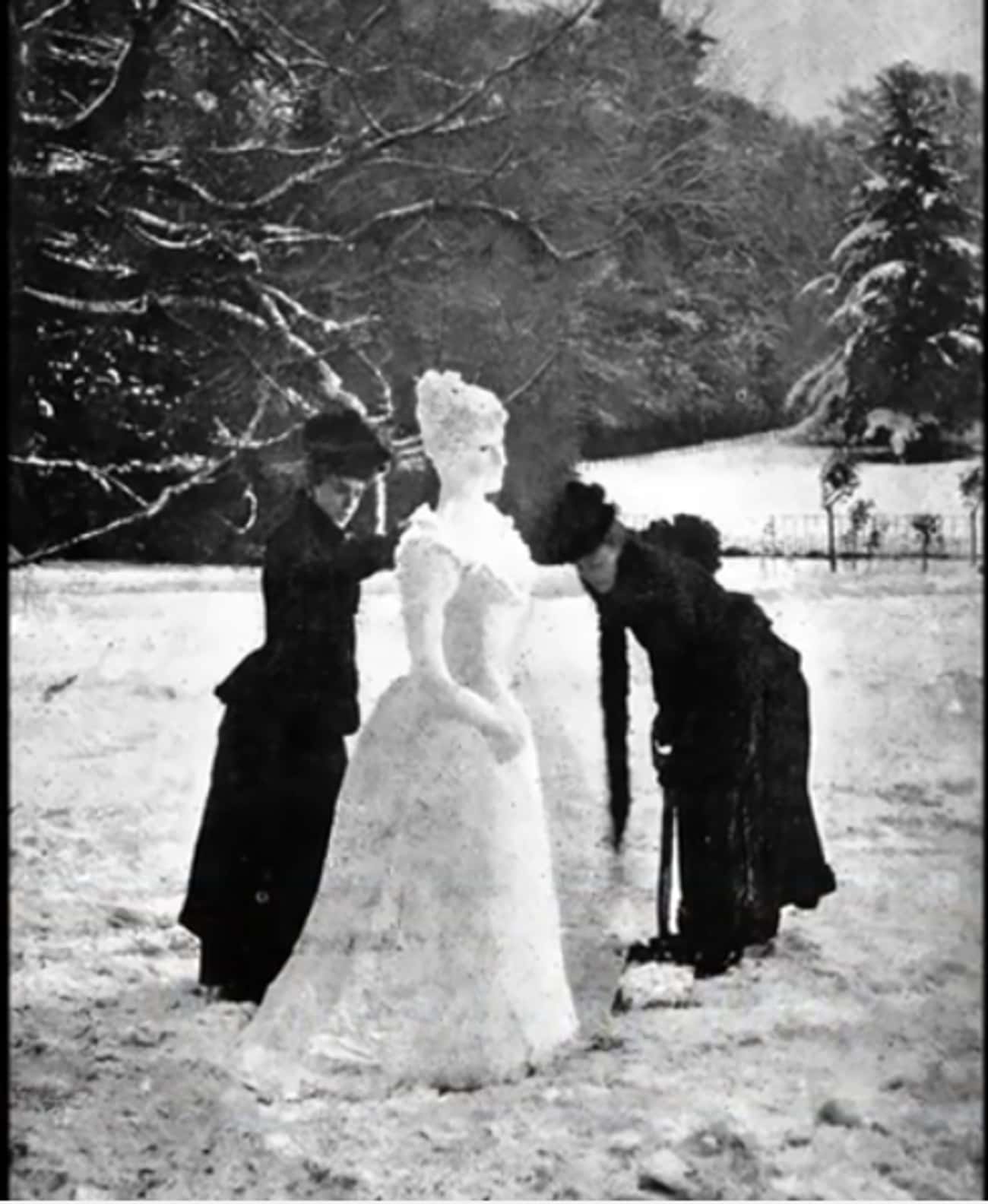 Victorian Women Making A Snow Lady