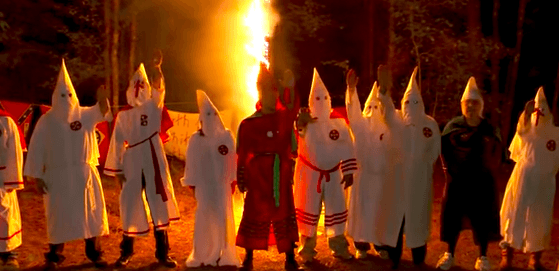 KKK Rally And Cross Burning is listed (or ranked) 9 on the list Unsettling Photos of Innocent Children Born Into KKK Families