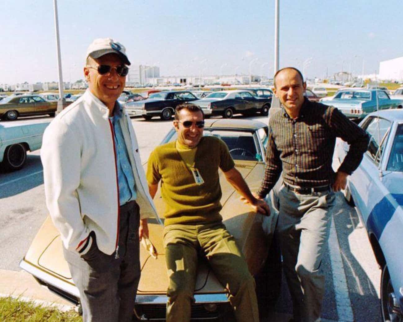 Pete Conrad, Dick Gordon, And Al Bean Pose With A Corvette in 1969