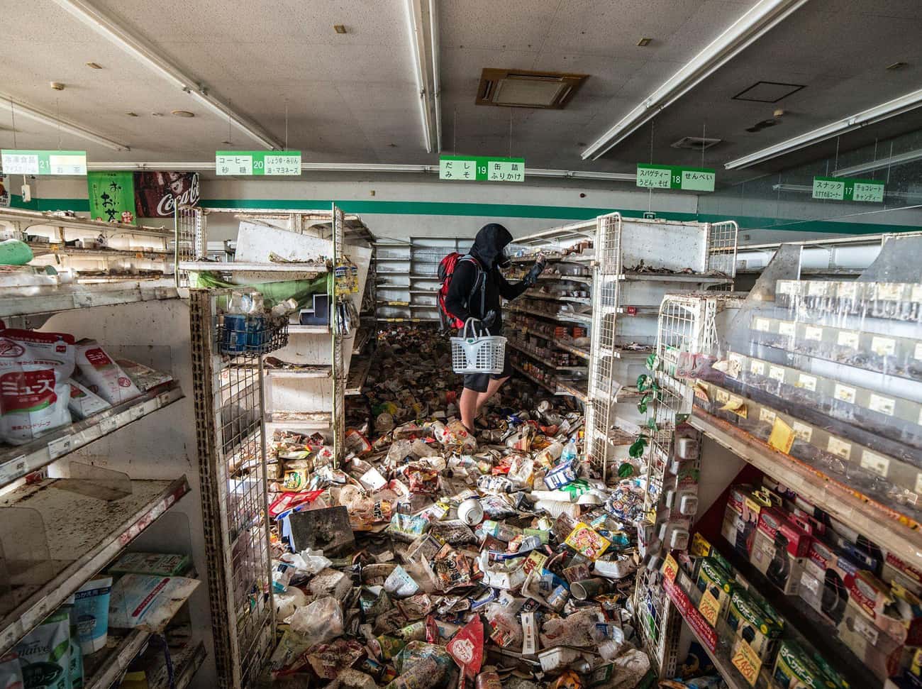 Goods Spill Out Of Shelves In An Abandoned Supermarket Near The Blast Zone