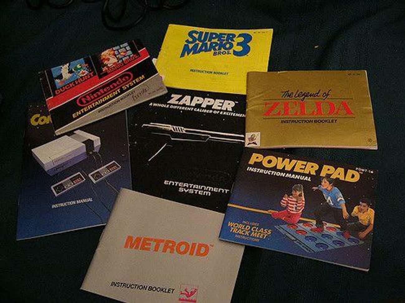 Flipping Through Paper Instruction Booklets That Are Included With The Cartridges