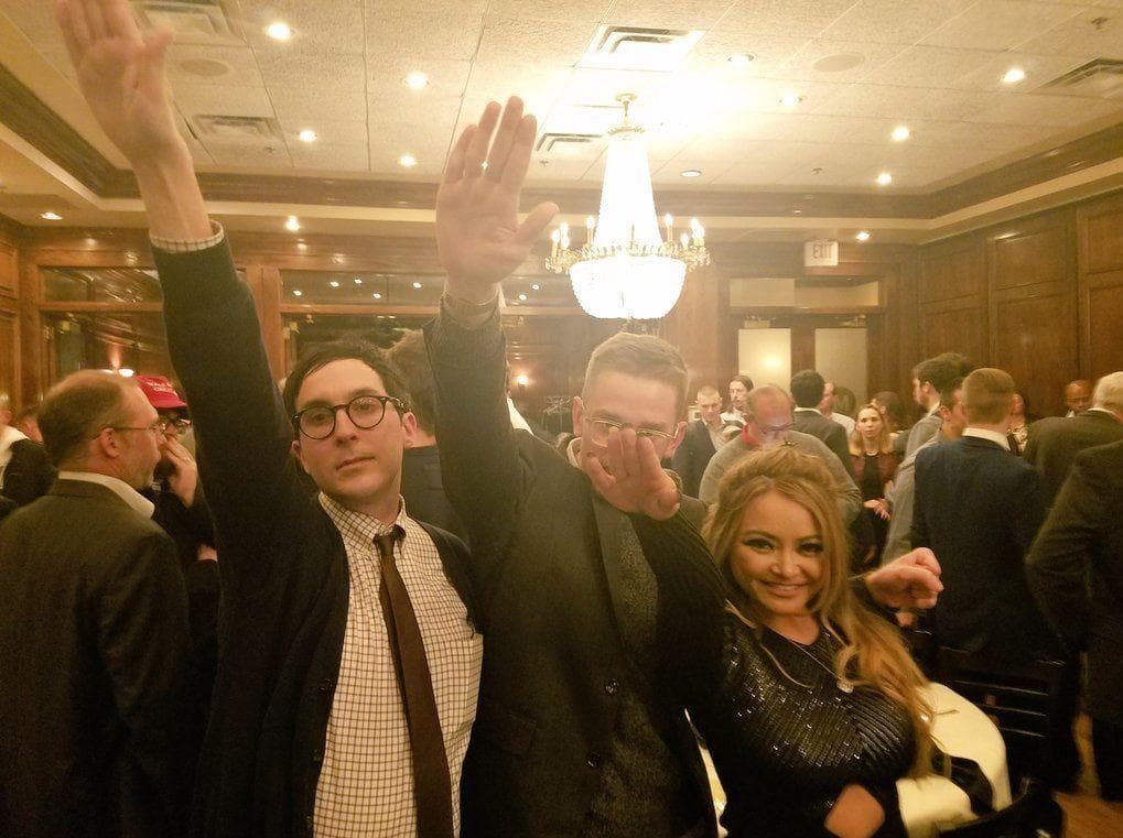Tila Tequila and other two clicking a photo giving a Nazi salute