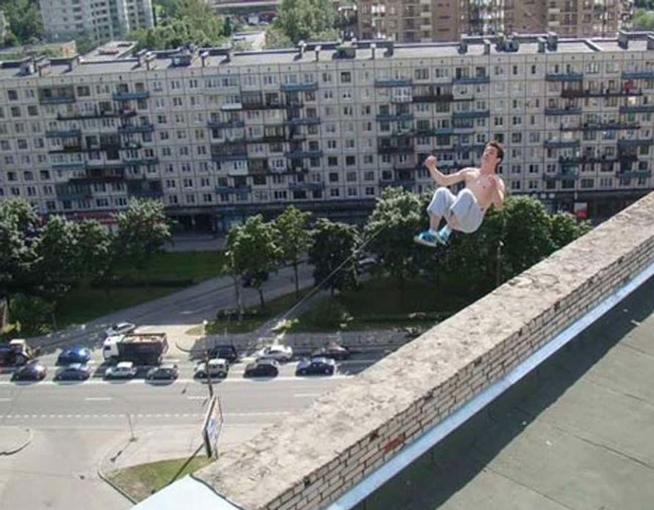 Pavel Kashin Performs A Stunt Shortly Before Falling Off Of A Building, 2013