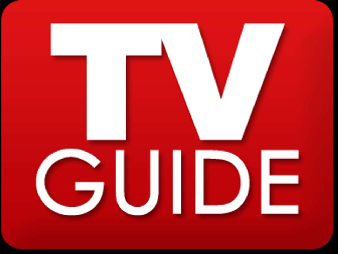 Reading &#39;TV Guide&#39; To Check On Television Show Times