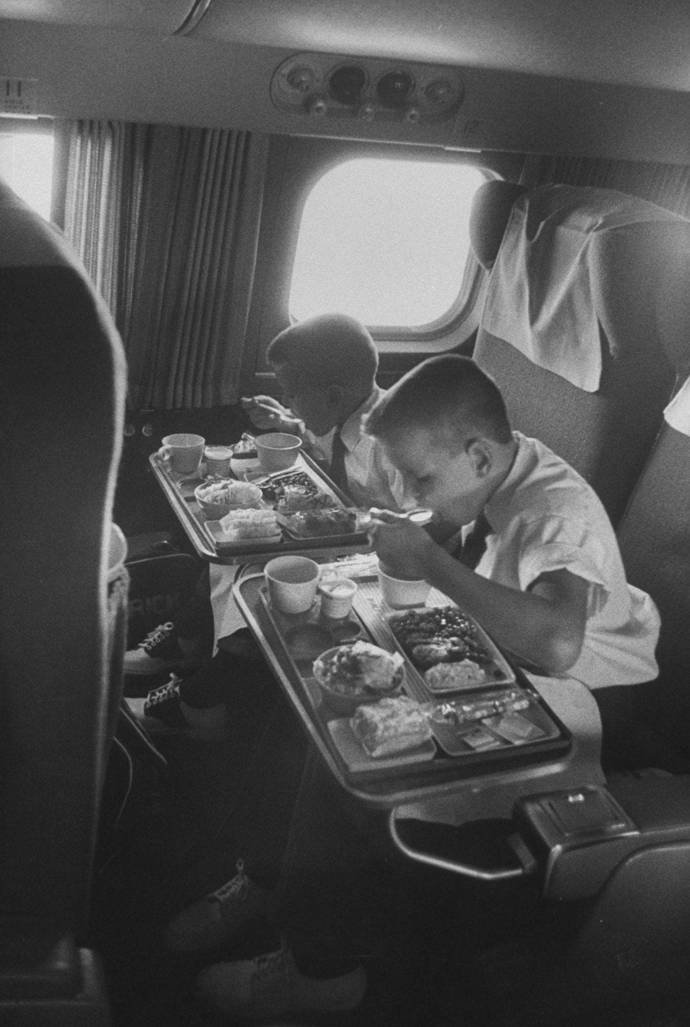 1955 - Boys Eating More Food Than You Get In A Standard Airline Meal