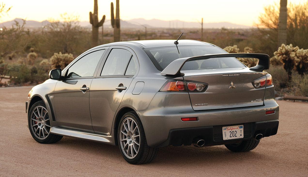 5. Митсубиси япония. Митсубиси лансер 10 японец. Митсубиси лансер япония. Митсубиси лансер япония.