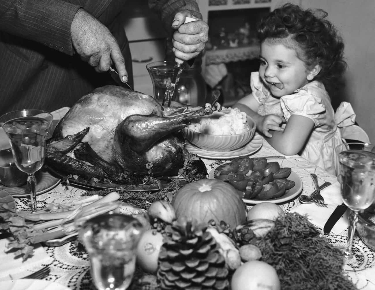 A Young Child Excited For Some Turkey - 1945