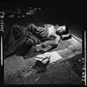 A Victim Lies In A Makeshift Hospital In A Bank Building on Random Most Haunting Photos Of Hiroshima, Taken In The Aftermath Of The Atomic Bomb
