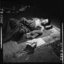 A Victim Lies In A Makeshift Hospital In A Bank Building on Random Most Haunting Photos Of Hiroshima, Taken In The Aftermath Of The Atomic Bomb