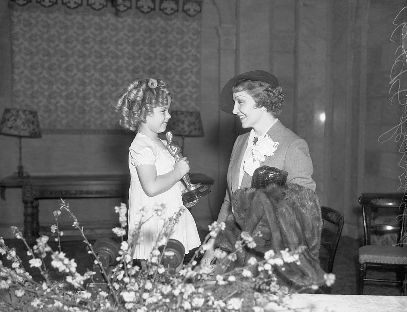 Shirley Temple Presents An Oscar To Claudette Colbert, 1935