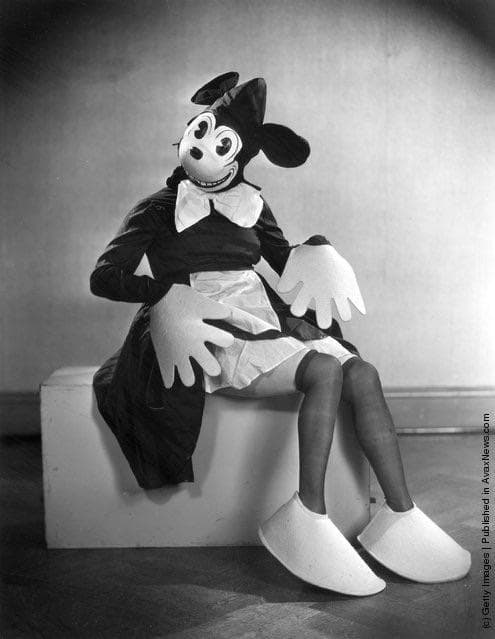 A Woman Dressed As Minnie Mous is listed (or ranked) 13 on the list The Creepiest Photos From History