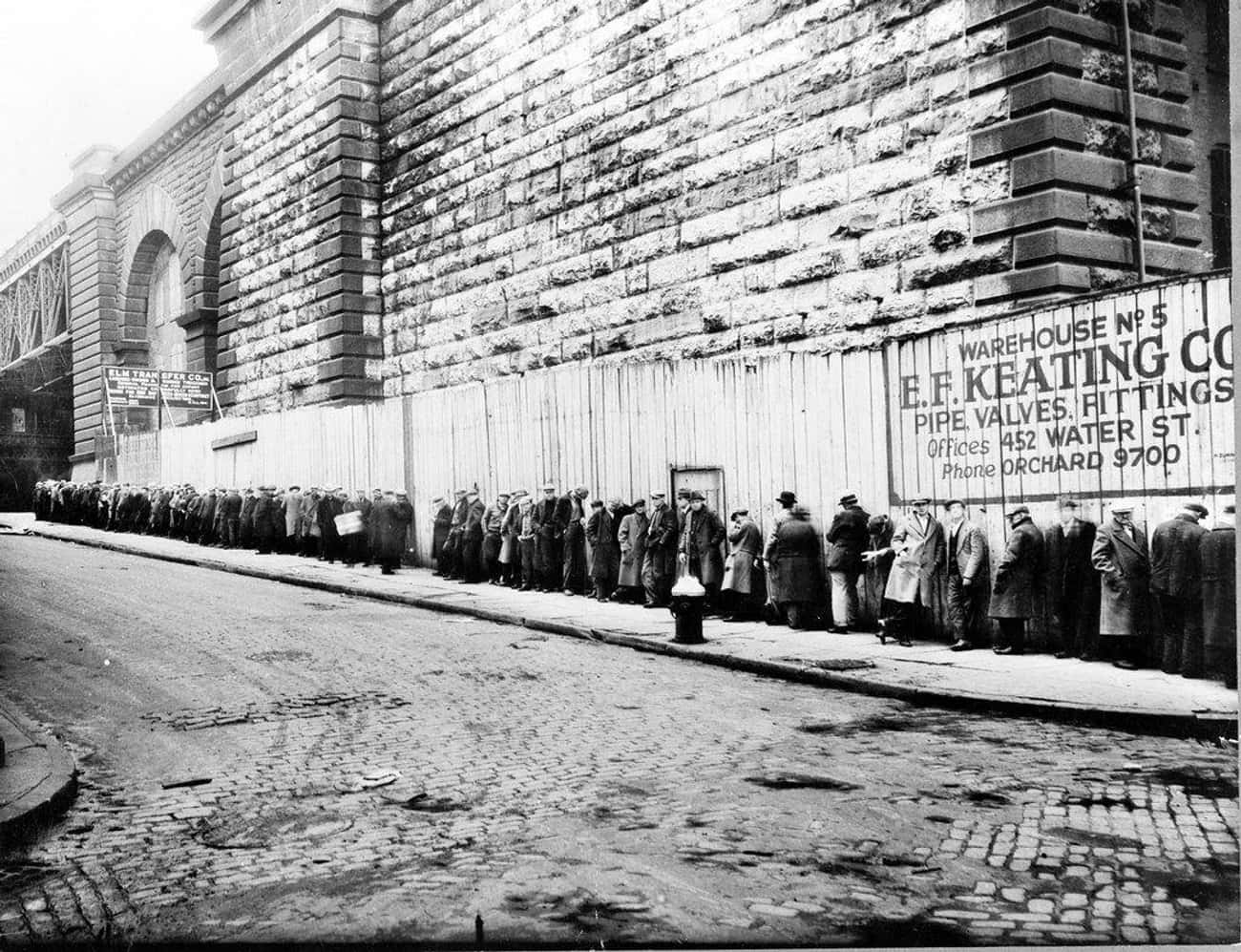 A Bread Line Wraps Around The Block Outside The Brooklyn Bridge, New York, 1930s