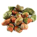 Unakite Tumbled Stones on Random Best Crystals for Purification