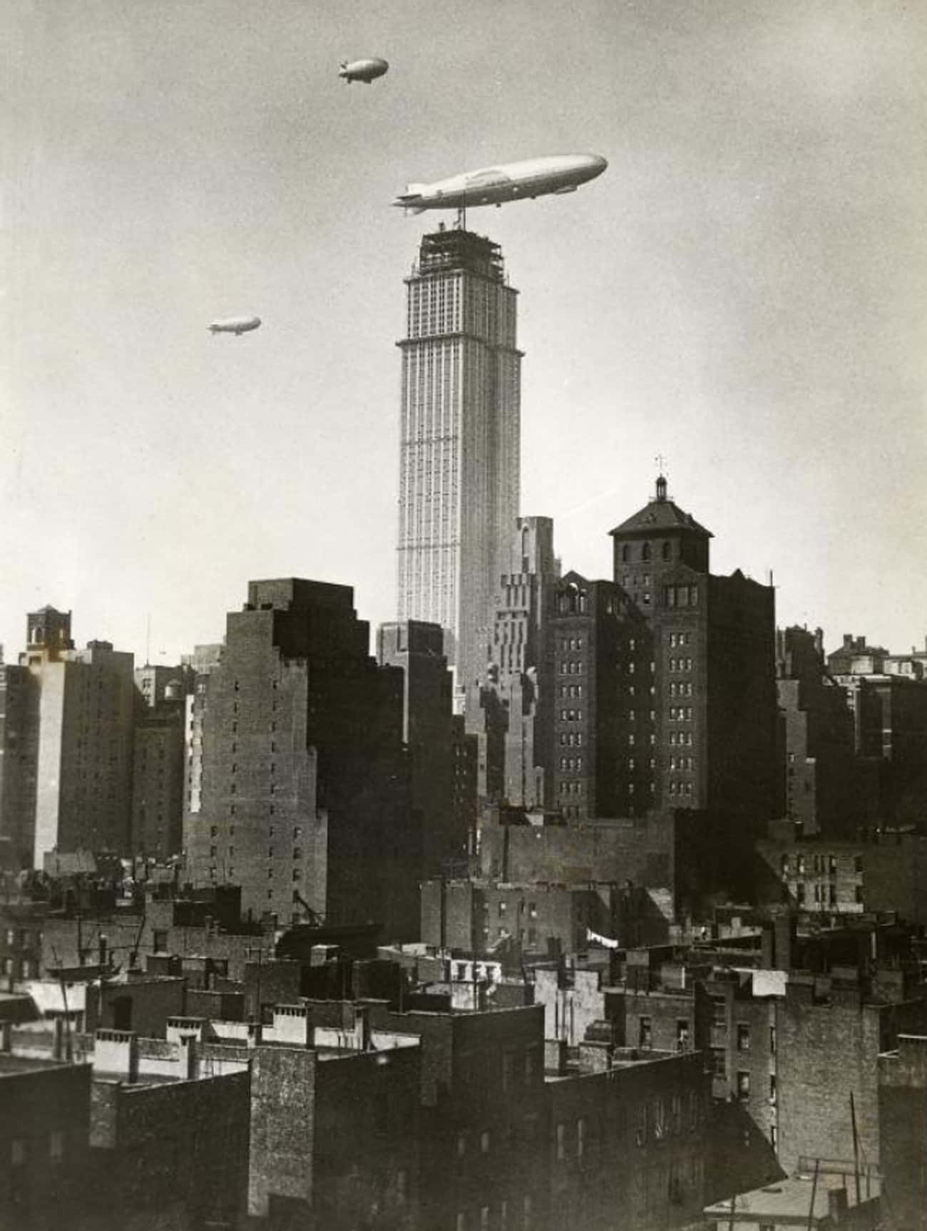 Zeppelin Over An In-Construction Empire State Building