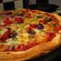 Pizza is listed (or ranked) 9 on the list Things You Spent Too Much Money On As A Kid