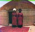Two Men In Front Of A Yurt on Random These Gorgeous, Century-Old Color Photos Captured Imperial Russia In Years Before Revolution