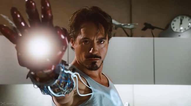 In this scene, you can see the energy moving from the Arc Reactor to his Repulsor.