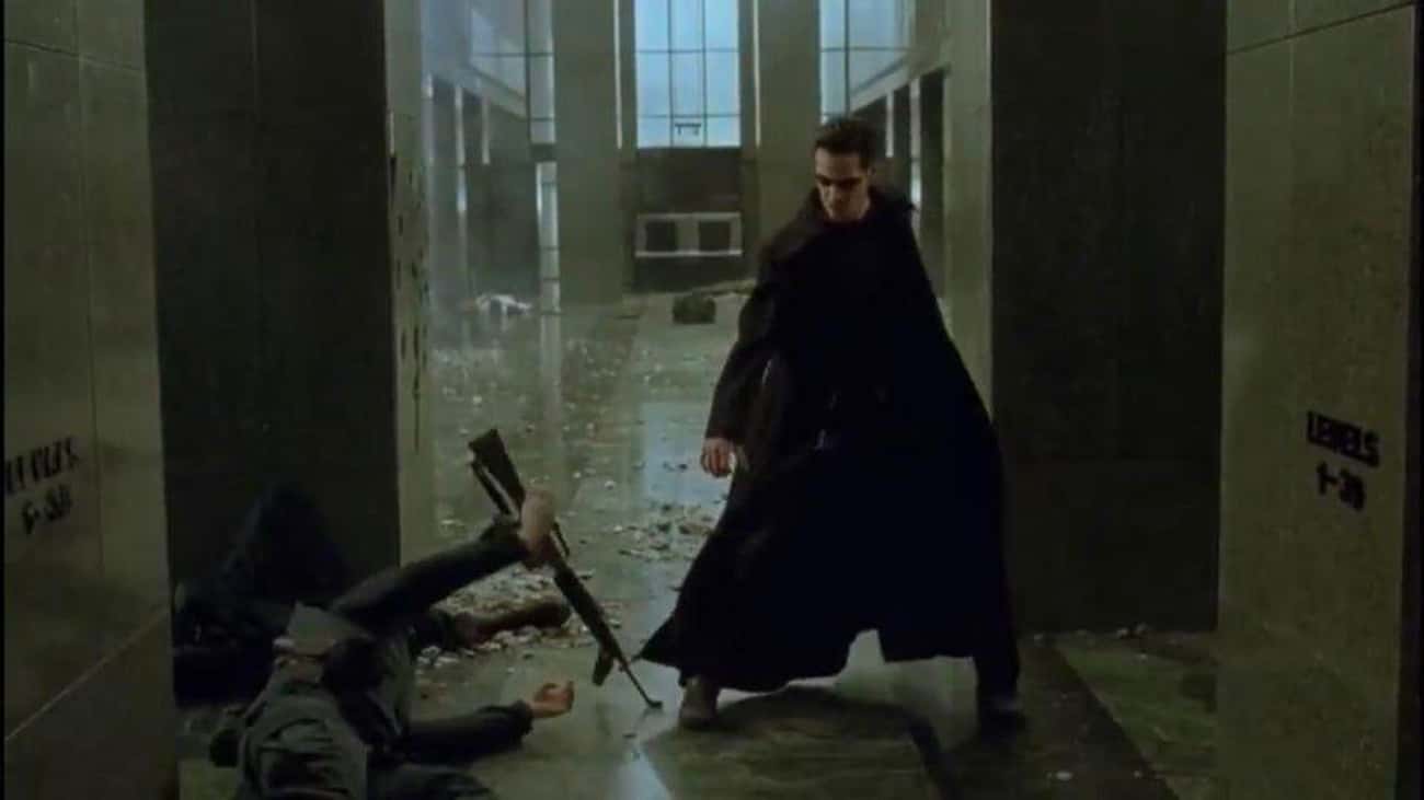 A Gun Barrel Bends During The Lobby Fight In 'The Matrix'