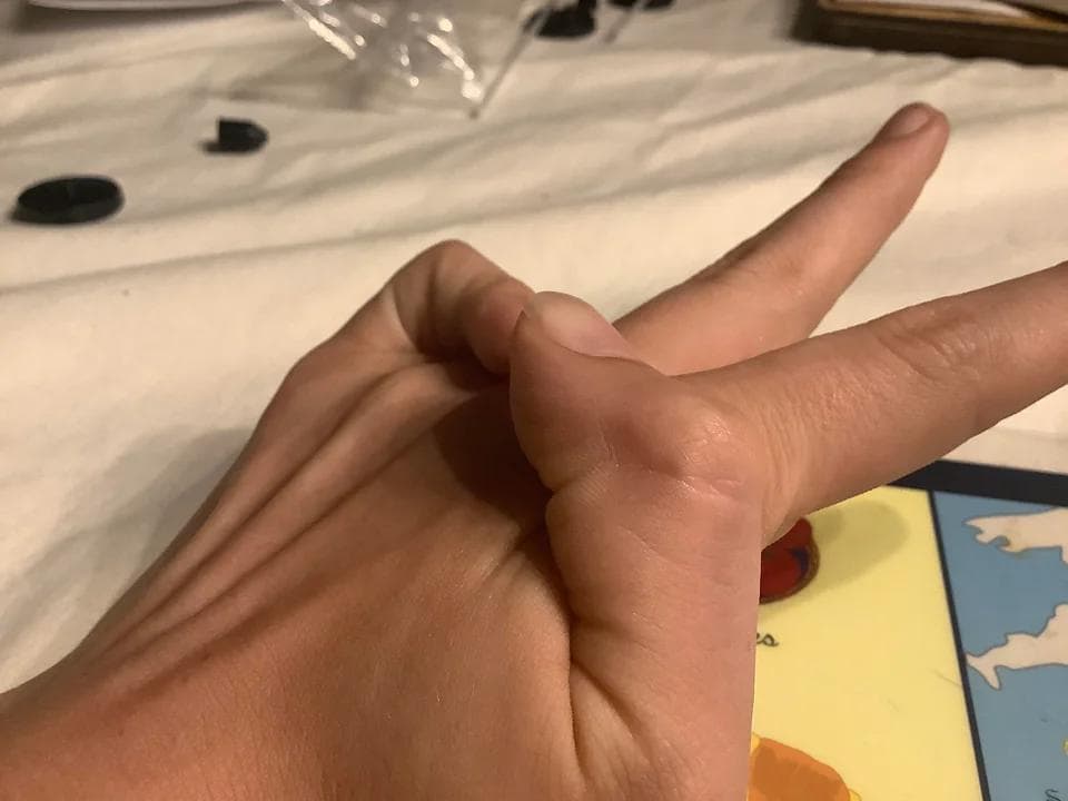 My Thumb And Pinkie Can Touch Each Other On The Back Side Of My Hand