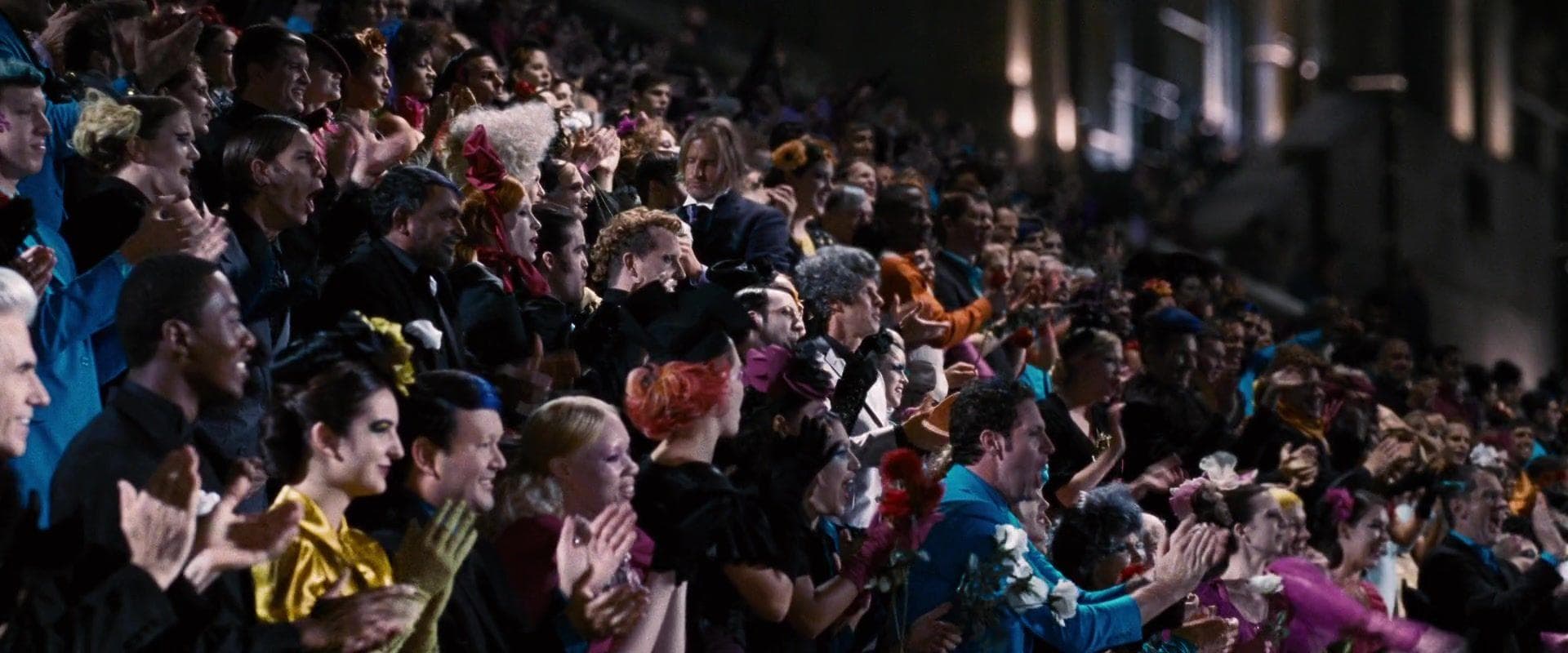 Haymitch Smells A Flower In 'The Hunger Games'