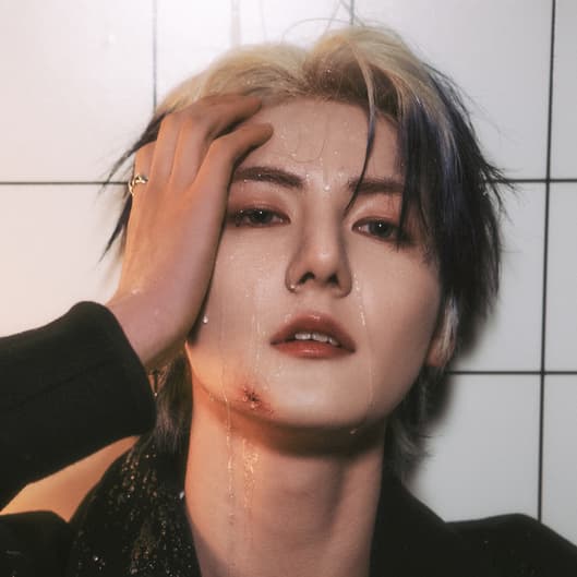 20+ K-pop Idols Who Are INTP, Ranked By Fans