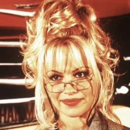 Young Pamela Anderson With Glasses and an Updo